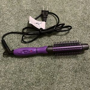 Purple plugged curling brush